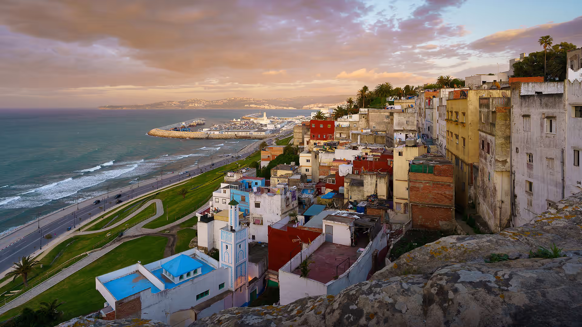 White buildings of Tangier above the water of the Strait of Gibraltar